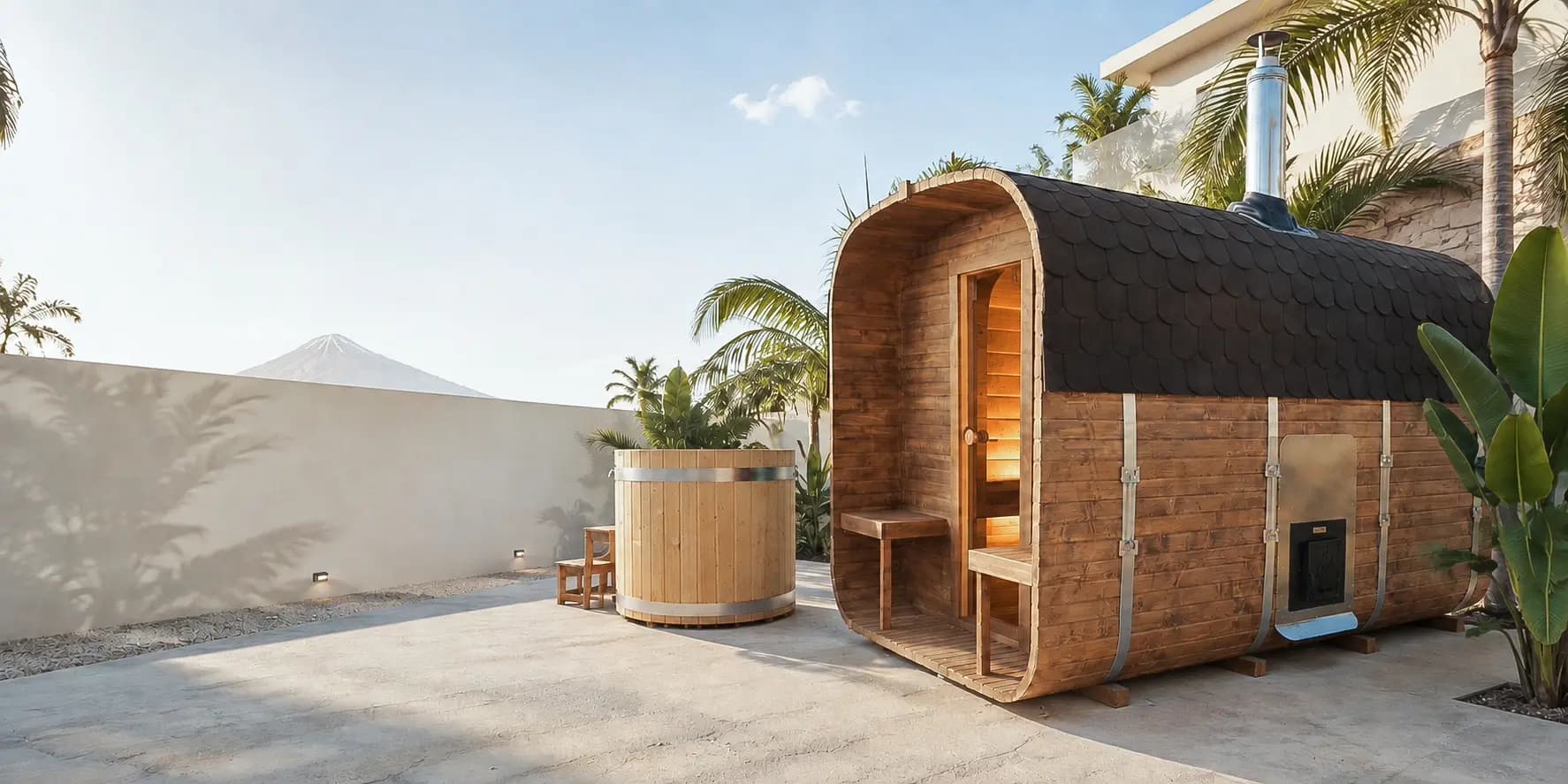 Sauna de barril exterior sobre terraza de piedra volcánica con el Teide al fondo